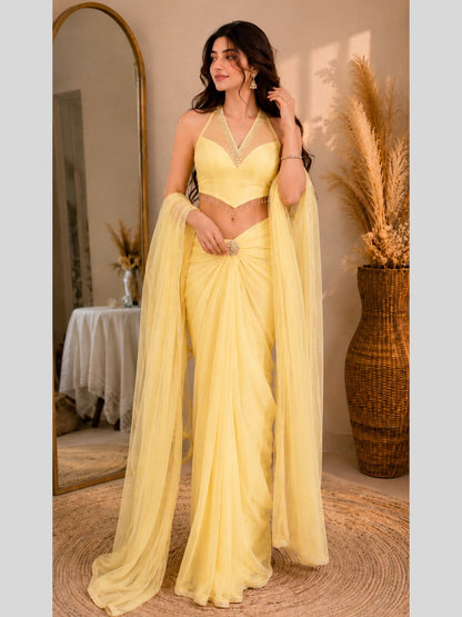 Adaa Bazaar Georgette Embellished Pre-Draped Skirt Set with Designer Halter Blouse and Dupatta.
